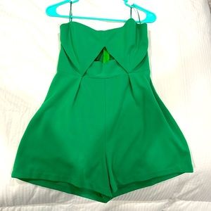 Super cute romper, strapless, with a peekaboo under bra